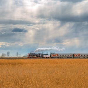 железнодорожный фотограф сергей крылов паровоз челябинская область ретропоезд лето дым пар жд поезд победы лебедянка аргаяш поле оранжевый небо твз юужд челябинская область